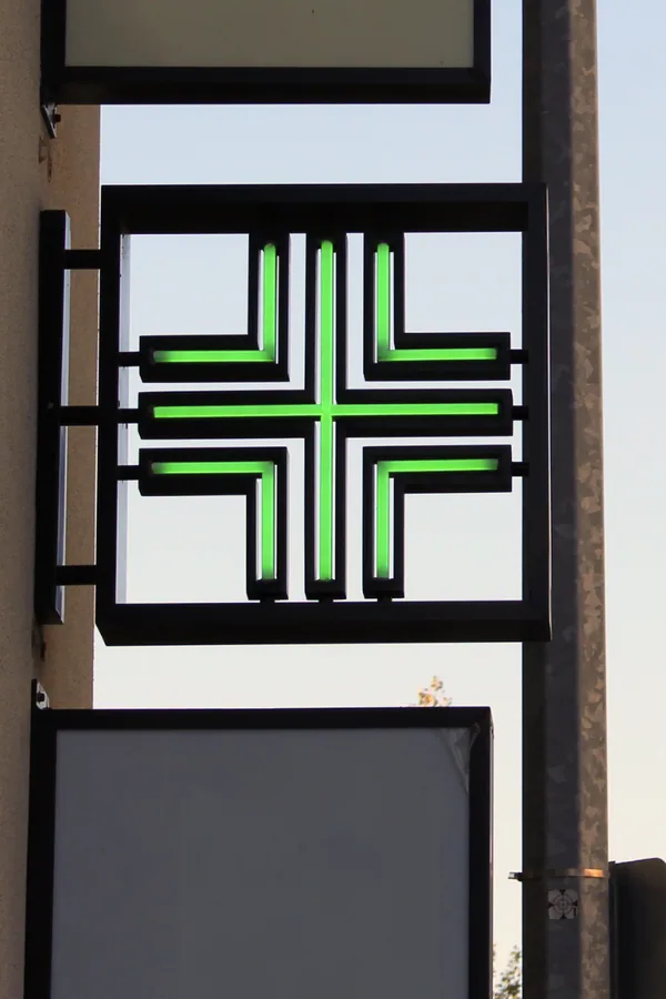 Penny Fausta Pharmacy interior and cross mark